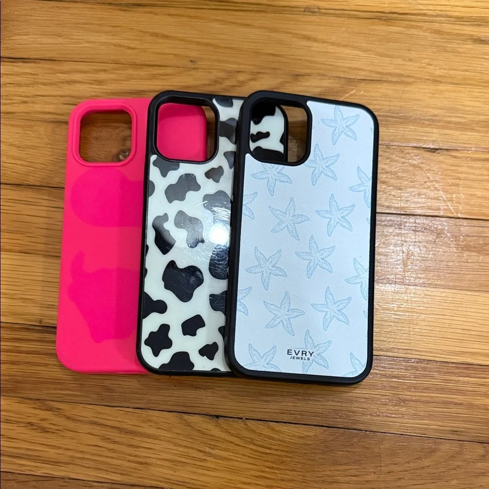 phone cases! iphone 12. hot pink, cow print, and blue starfish every jewels